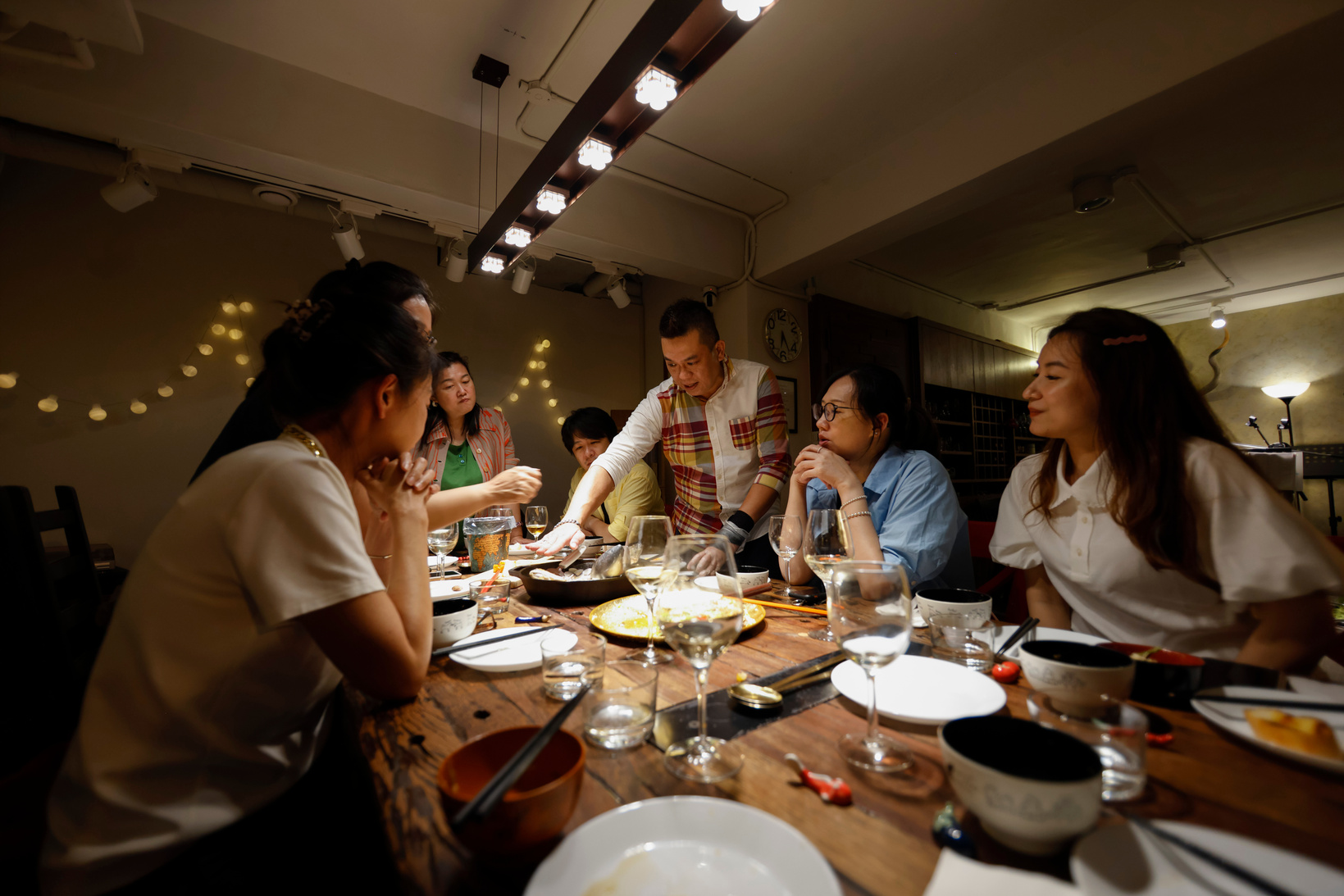 Private kitchen chef busy serving guests