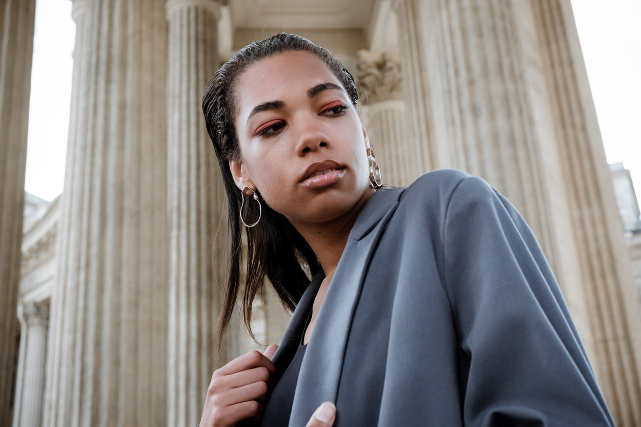 Woman in Blue Robe Wearing White Head Band