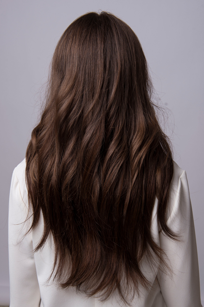 Back View of a Woman with Long Wavy Hair